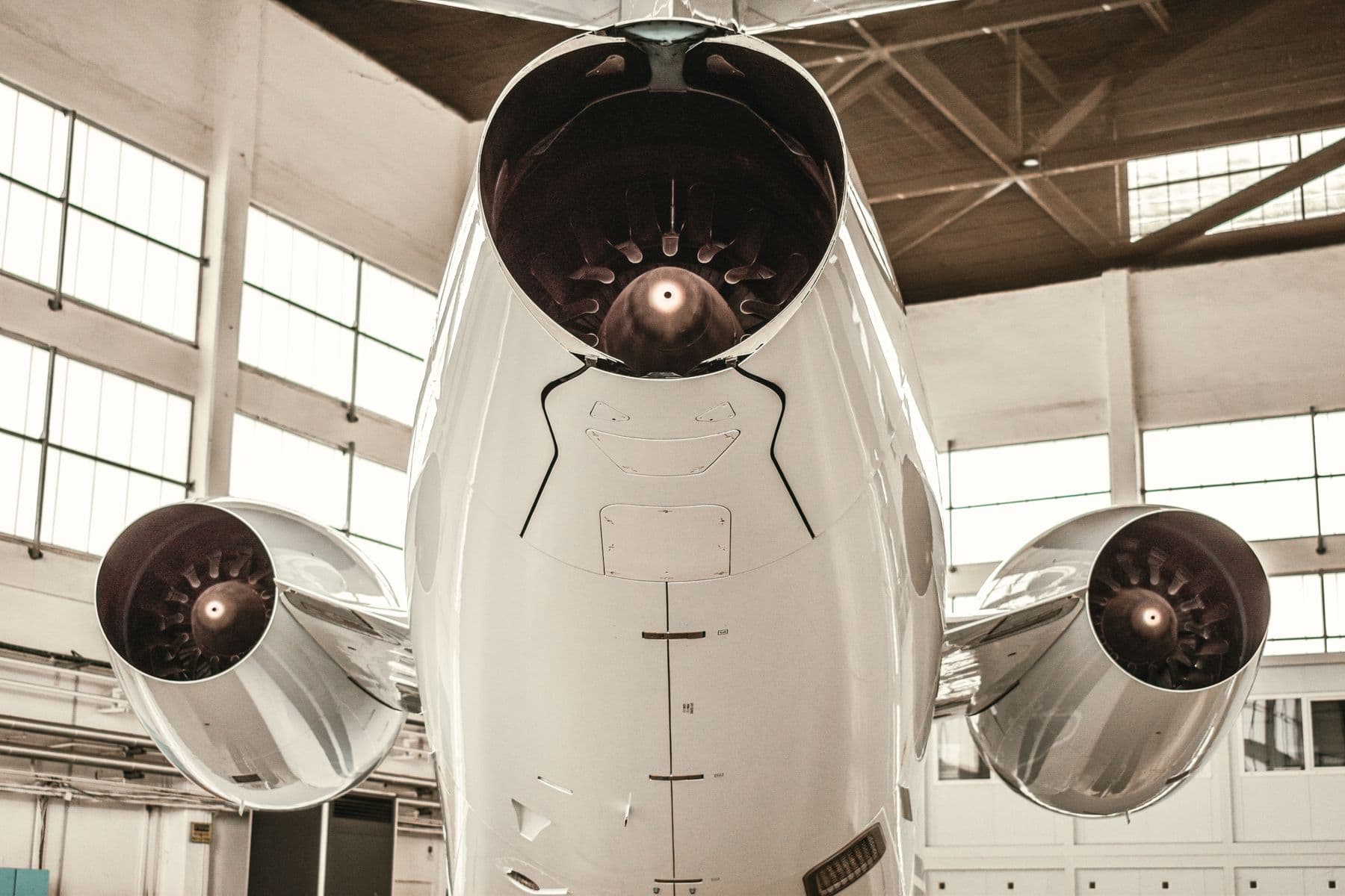 Engines of a private jet in a hangar